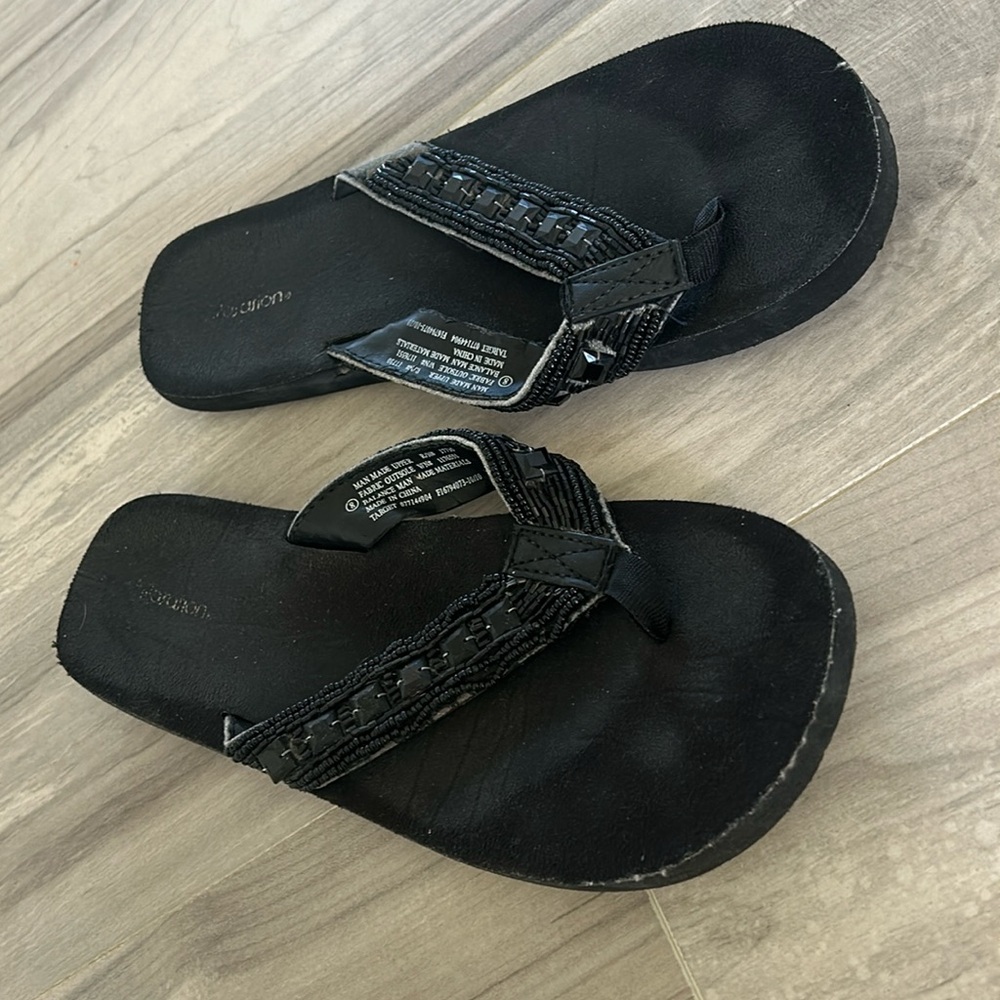 Black flip flops